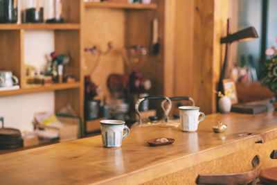 Close-up of coffee cup on table