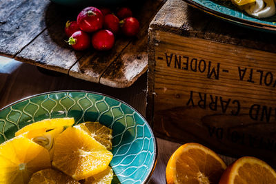 High angle view of orange fruits on table