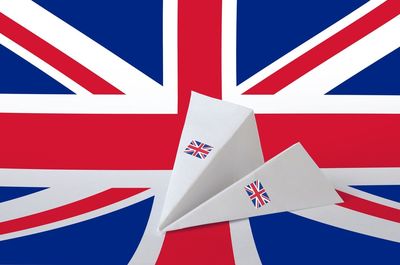 Close-up of flag against blue background