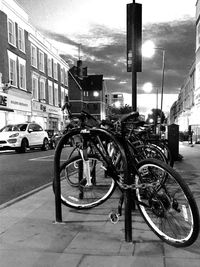 Cars parked on street in city