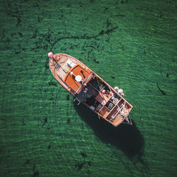 High angle view of boat floating on sea