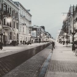 Street amidst buildings in city against sky