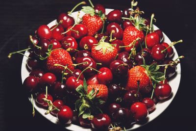 High angle view of cherries in bowl