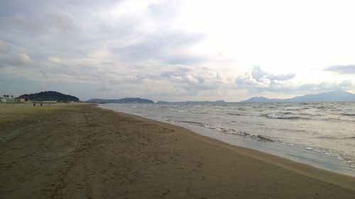 Scenic view of beach against sky