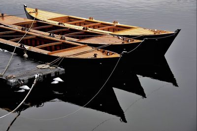 Boat moored in water