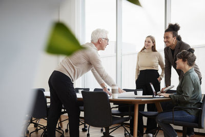 Architects having meeting in office