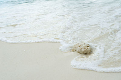 High angle view of sand on beach