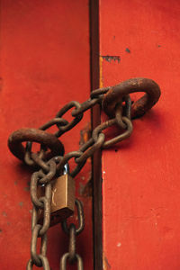 Close-up of padlock on metal door