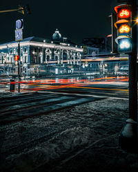 Light trails on city street at night