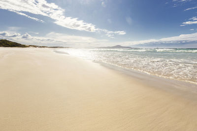 Scenic view of beach against sky