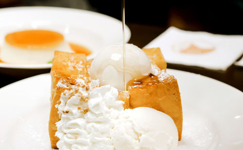 Close-up of dessert served on table