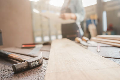 Close-up of wooden table and tables