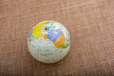 High angle view of globe on table