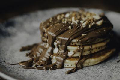 Close-up of chocolate cake in plate on table