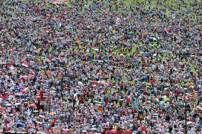 Crowd of hungarian catholic pilgrims gathering in csiksomlyo to celebrate the pentecost