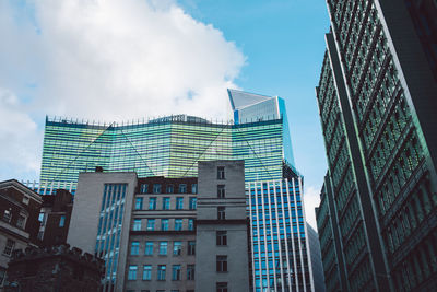 Low angle view of skyscrapers against sky