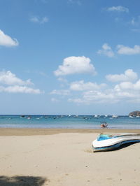 Scenic view of beach against sky