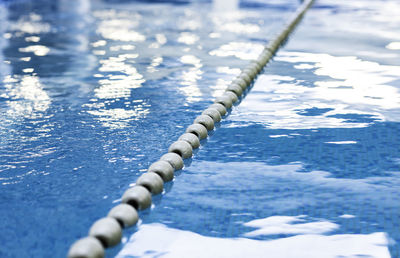 High angle view of rope on swimming pool