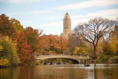 Arch bridge over river during autumn