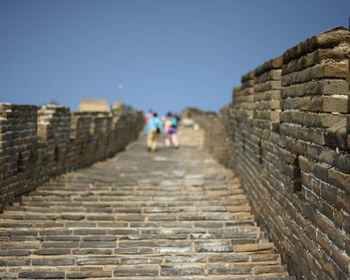 Pathway at great wall of china against clear sky