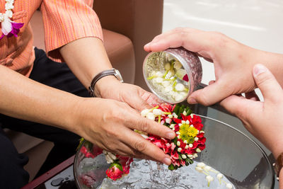 High angle view of woman holding hands