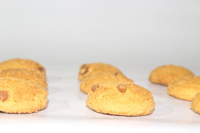 Close-up of cookies against white background