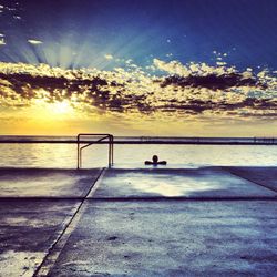 Scenic view of sea at sunset