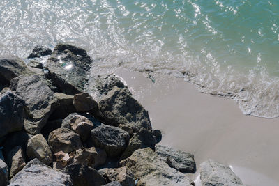 High angle view of rocks on beach