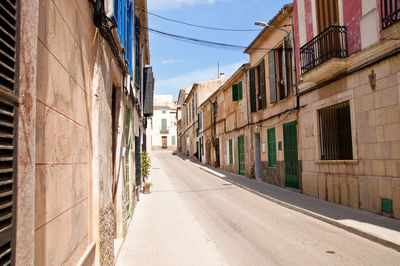 Street amidst mediterrean buildings in city