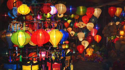 Illuminated lanterns hanging at night