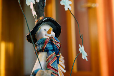 Close-up of snowman figurine during christmas