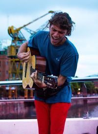 Young man playing guitar