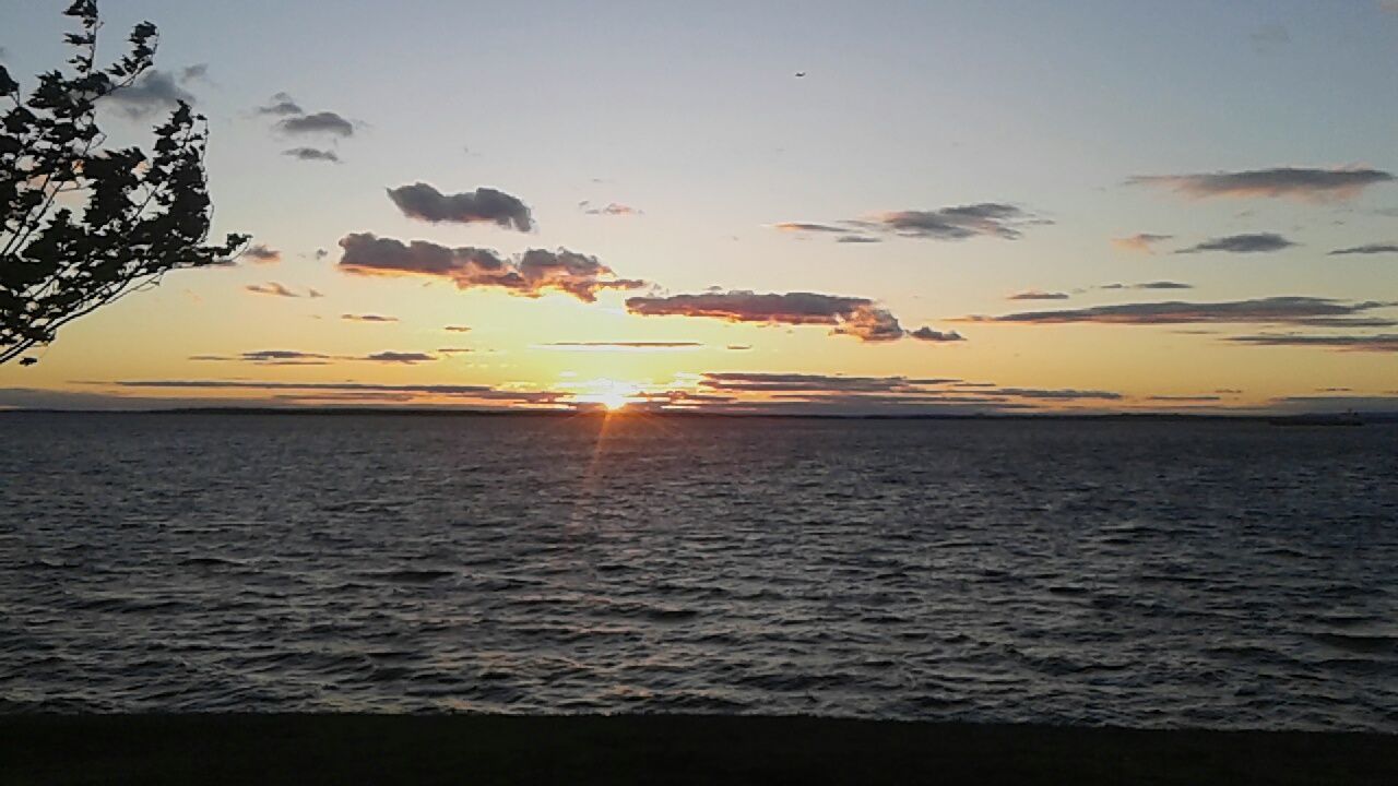 SCENIC VIEW OF SEA DURING SUNSET