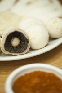 Close-up of bread in plate on table