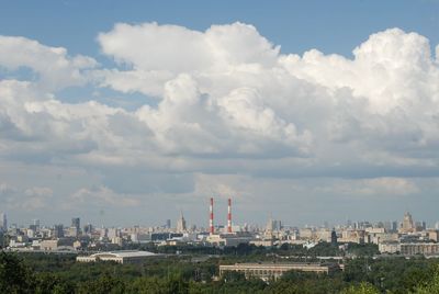 Buildings in city against sky