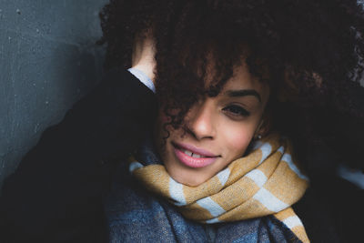 Portrait of smiling woman in snow