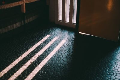 High angle view of shadow on window