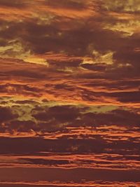 Low angle view of clouds in sky during sunset