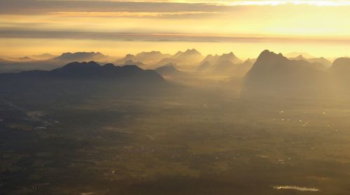 Scenic view of mountains against sky during sunset