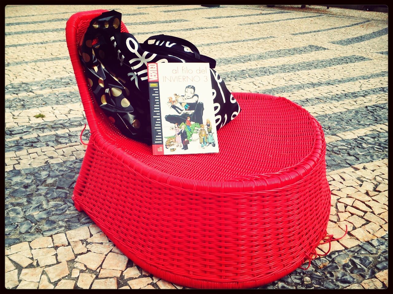 red, transfer print, auto post production filter, cobblestone, absence, seat, high angle view, chair, day, empty, close-up, outdoors, no people, still life, paving stone, sunlight, sidewalk, street, shoe, pattern