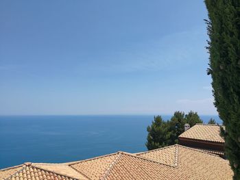 High angle view of sea against blue sky