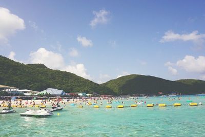 Scenic view of sea against blue sky