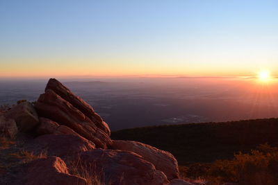 Scenic view of mountains at sunset