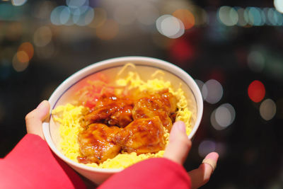 Close-up of hand holding food