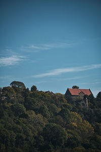 Buildings in city against sky