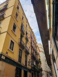 Low angle view of residential building against sky