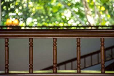 Close-up of railing on table in park