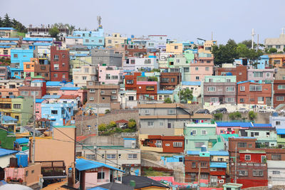 Buildings in city against sky