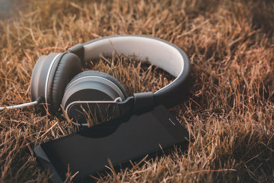 High angle view of sunglasses on field