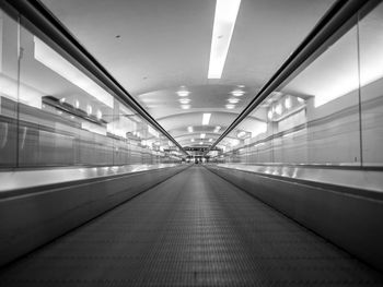 Illuminated moving walkway at airport